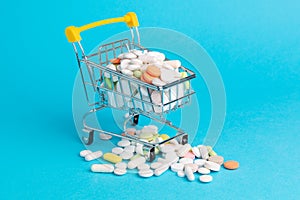 Medicinal antibiotic pills in shopping cart