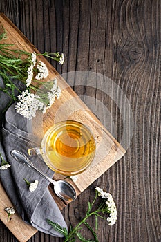 Medicinal herbal tea made from Yarrow, remedy for wound healing with copy space