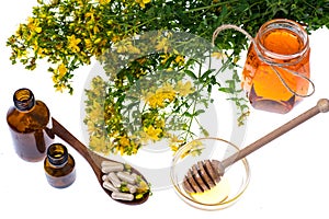 Medicinal herbs, honey, natural capsules and pills in medicine