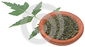 Medicinal neem leaves with crushed ones