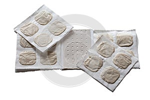Medicinal paper sheets with mustard and pepper plaster for the treatment of colds on a white background