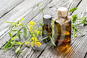 Medicinal plant Lathyrus pratensis and pharmaceutical bottles