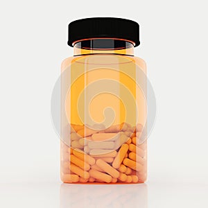 Medicine bottle with capsules isolated on white background.