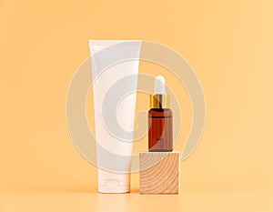 Medicine bottle placed, Blank label package for mockup on the orange background. The concept of natural beauty products.