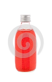 Medicine bottle with red syrup