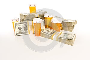 Medicine Bottles and Stacks of Hundreds of Dollars