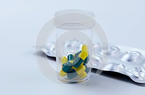 Medicine capsule on white background. Scattered capsules medicine