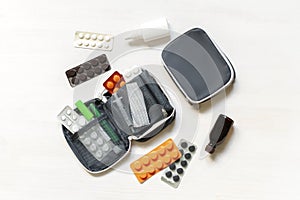 Daily medicine chest, container of pills, tablets, vitamins, travel first aid kit. pill box dispenser medications, nutritional