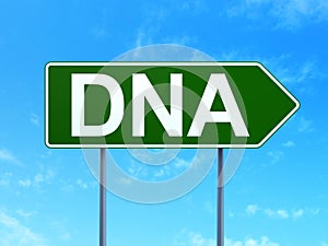 Medicine concept: DNA on road sign background