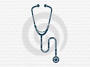 Medicine concept: Stethoscope on wall background