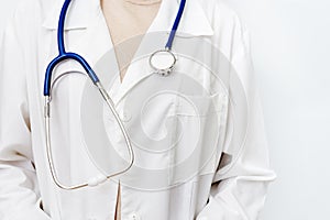 Medicine doctor close up in white coat with stethoscope. Healthcare