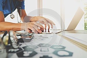 Medicine doctor hand working with modern computer with digital m