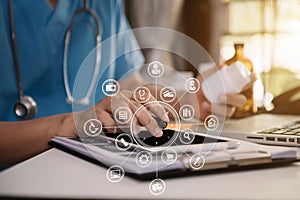 Medicine doctor hand working with modern digital tablet computer.