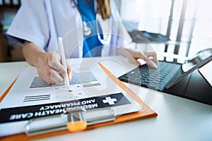 Medicine doctor hand working with modern digital tablet computer interface as medical network concept in