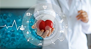 Medicine doctor holding red heart shape and icon medical network