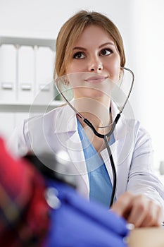 Medicine doctor measuring blood pressure