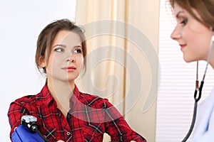 Medicine doctor measuring blood pressure