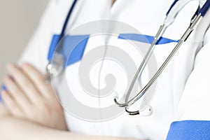 Medicine doctor with stethoscope in hand on hospital background, Medical technology, Healthcare and Medical concept