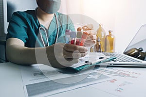 Medicine doctor touching on digital healthcare and network connection with modern virtual screen interface icons on the hospital