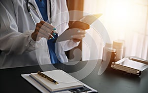 Medicine doctor working with digital medical interface icons on the hospital background, healthcare and Medical technology and