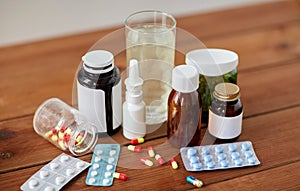 Medicine and drugs on wooden table