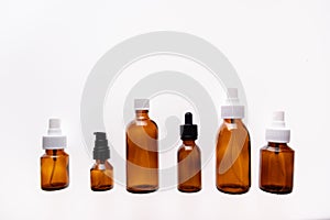 Medicine glass bottle on white background is used for cosmetic skin care product , containing products and medical supplies