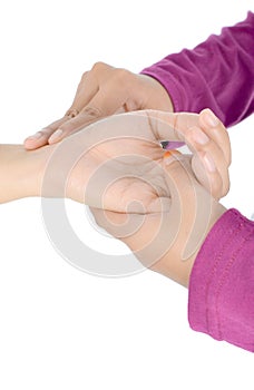 Medicine health care. Female hand checking pulse on wrist closeup.