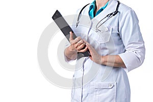 Medicine and healthcare concept. Doctor with stethoscope in clinic, close-up