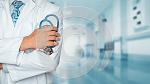 Medicine and healthcare concept. Doctor with stethoscope in clinic, close-up photo
