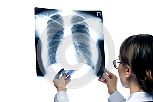 Medicine and Healthcare. Confident Professional Radiologist Doctor Checking Patient Xray Film On Screen Against White