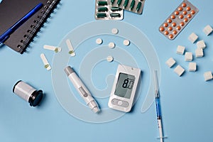 Medicine, healthcare, technology and online pharmacy concept. A diabetic measures your blood glucose