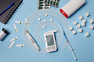 Medicine, healthcare, technology and online pharmacy concept. A diabetic measures your blood glucose
