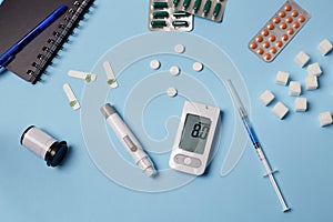 Medicine, healthcare, technology and online pharmacy concept. A diabetic measures your blood glucose