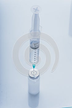 Medicine, Injection, vaccine and disposable syringe, drug concept. Sterile vial medical syringe needle. Glass medical