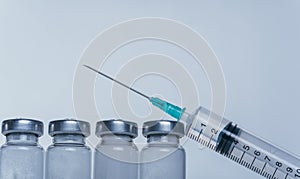 Medicine, Injection, vaccine and disposable syringe, drug concept. Sterile vial medical syringe needle. Glass medical