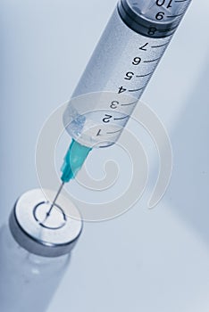 Medicine, Injection, vaccine and disposable syringe, drug concept. Sterile vial medical syringe needle. Glass medical