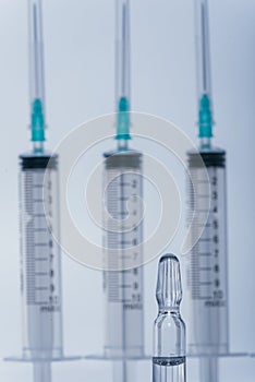 Medicine, Injection, vaccine and disposable syringe, drug concept. Sterile vial medical syringe needle. Glass medical