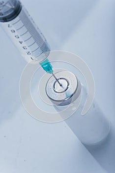 Medicine, Injection, vaccine and disposable syringe, drug concept. Sterile vial medical syringe needle. Glass medical