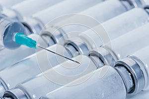 Medicine, Injection, vaccine and disposable syringe, drug concept. Sterile vial medical syringe needle. Glass medical