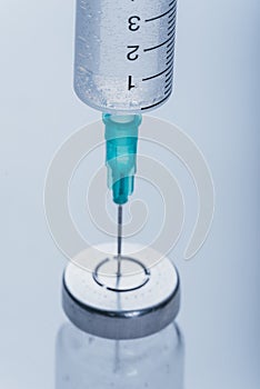 Medicine, Injection, vaccine and disposable syringe, drug concept. Sterile vial medical syringe needle. Glass medical