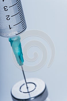 Medicine, Injection, vaccine and disposable syringe, drug concept. Sterile vial medical syringe needle. Glass medical