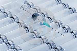 Medicine, Injection, vaccine and disposable syringe, drug concept. Sterile vial medical syringe needle. Glass medical