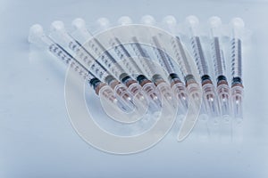 Medicine, Injection, vaccine and disposable syringe isolated, drug concept. Sterile vial medical. Macro close up on