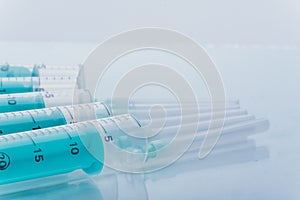 Medicine, Injection, vaccine and disposable syringe isolated, drug concept. Sterile vial medical. Macro close up on