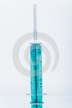 Medicine, Injection, vaccine and disposable syringe isolated, drug concept. Sterile vial medical. Macro close up on