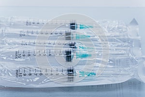 Medicine, Injection, vaccine and disposable syringe isolated, drug concept. Sterile vial medical. Macro close up on