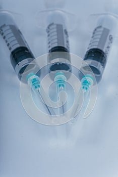 Medicine, Injection, vaccine and disposable syringe isolated, drug concept. Sterile vial medical. Macro close up on