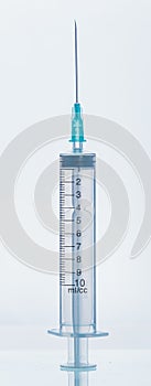 Medicine, Injection, vaccine and disposable syringe isolated, drug concept. Sterile vial medical. Macro close up on