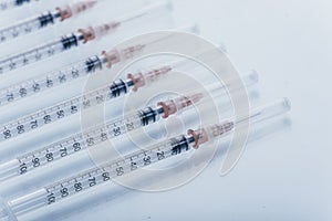 Medicine, Injection, vaccine and disposable syringe isolated, drug concept. Sterile vial medical. Macro close up on