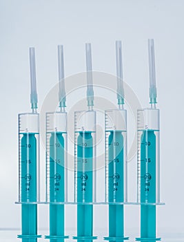 Medicine, Injection, vaccine and disposable syringe isolated, drug concept. Sterile vial medical. Macro close up on